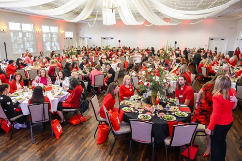 Photo of a crowded ballroom.